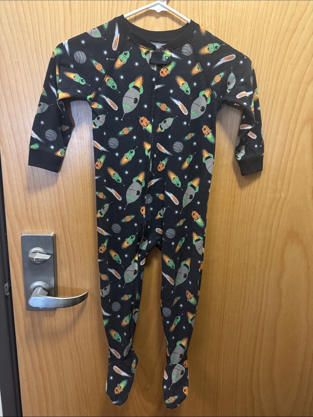 Just One You by Carter’s full zip onesie, size 3T. Has an outer space design.